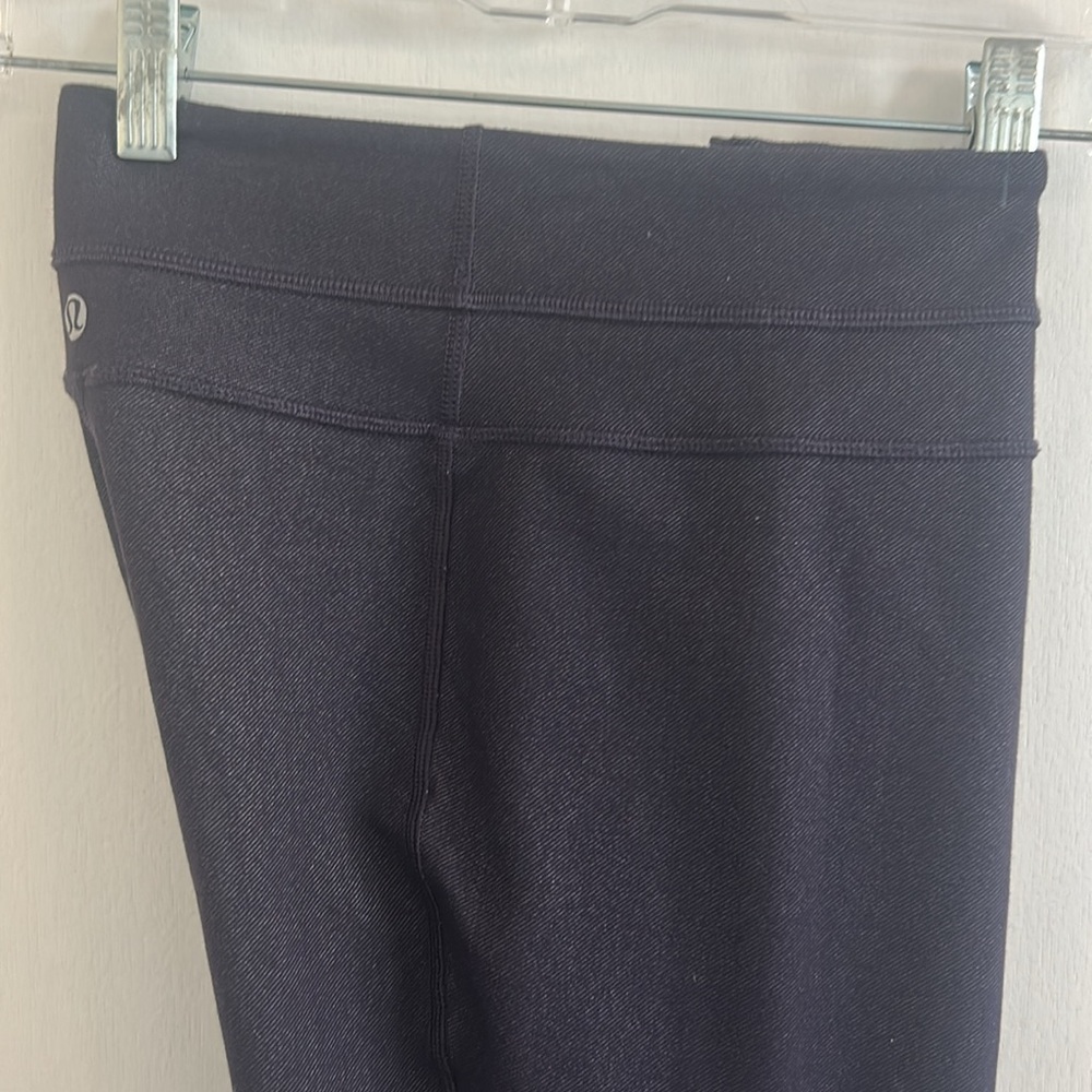 Lululemon VGUC purple leggings with inside waist pocket, longer in length.